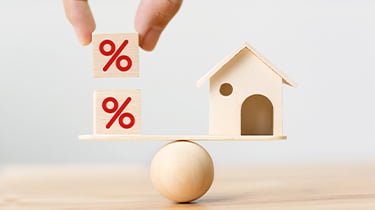 house and blocks balancing